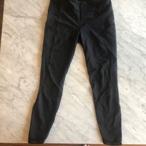 Lululemon crop running pant with mesh side panels.